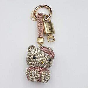 Authentic Louis Vuitton Lock & Key with Unbranded Hello kitty Charm, Keychain